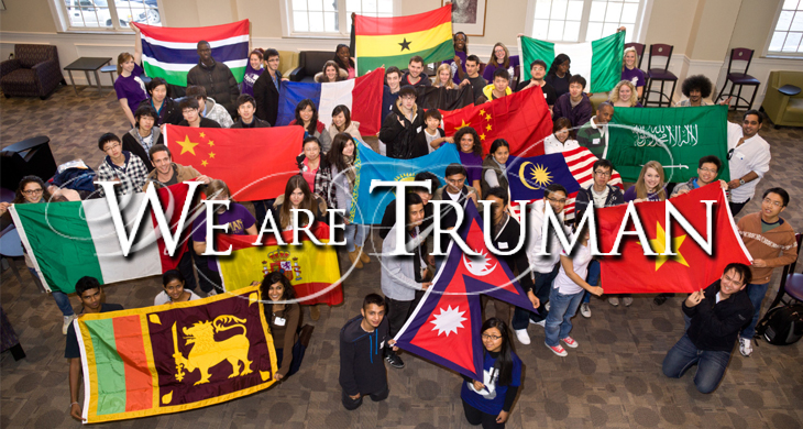 International Students holding their country of origin's flag